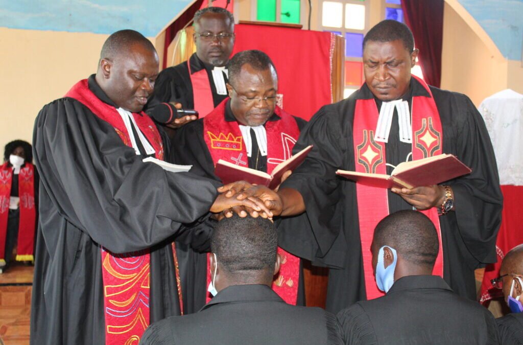 The Moderator of the PCC, the Rt. Rev. Fonki Samuel Forba ordains 14 pastors in PC Bafoussam